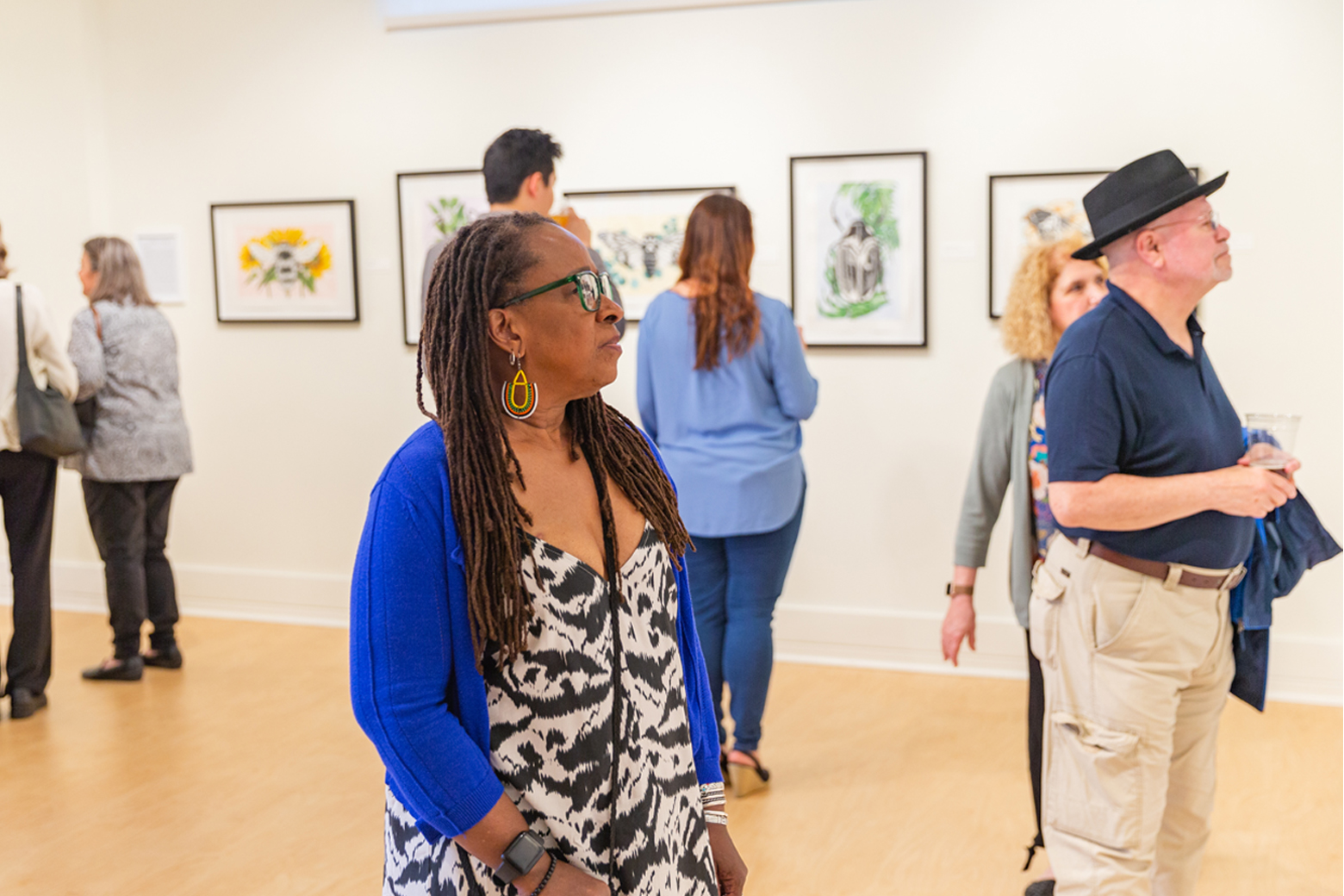 Guests looking at artwork 