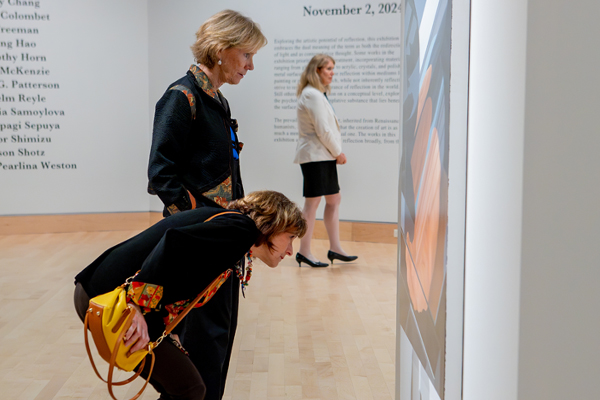 Patrons getting a closer look in the Main gallery, Torggler Fine Arts Center