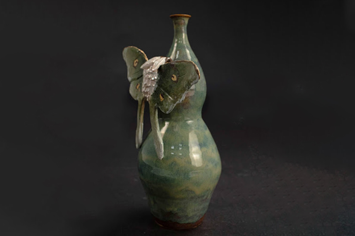 Handmade ceramic with butterfly detail