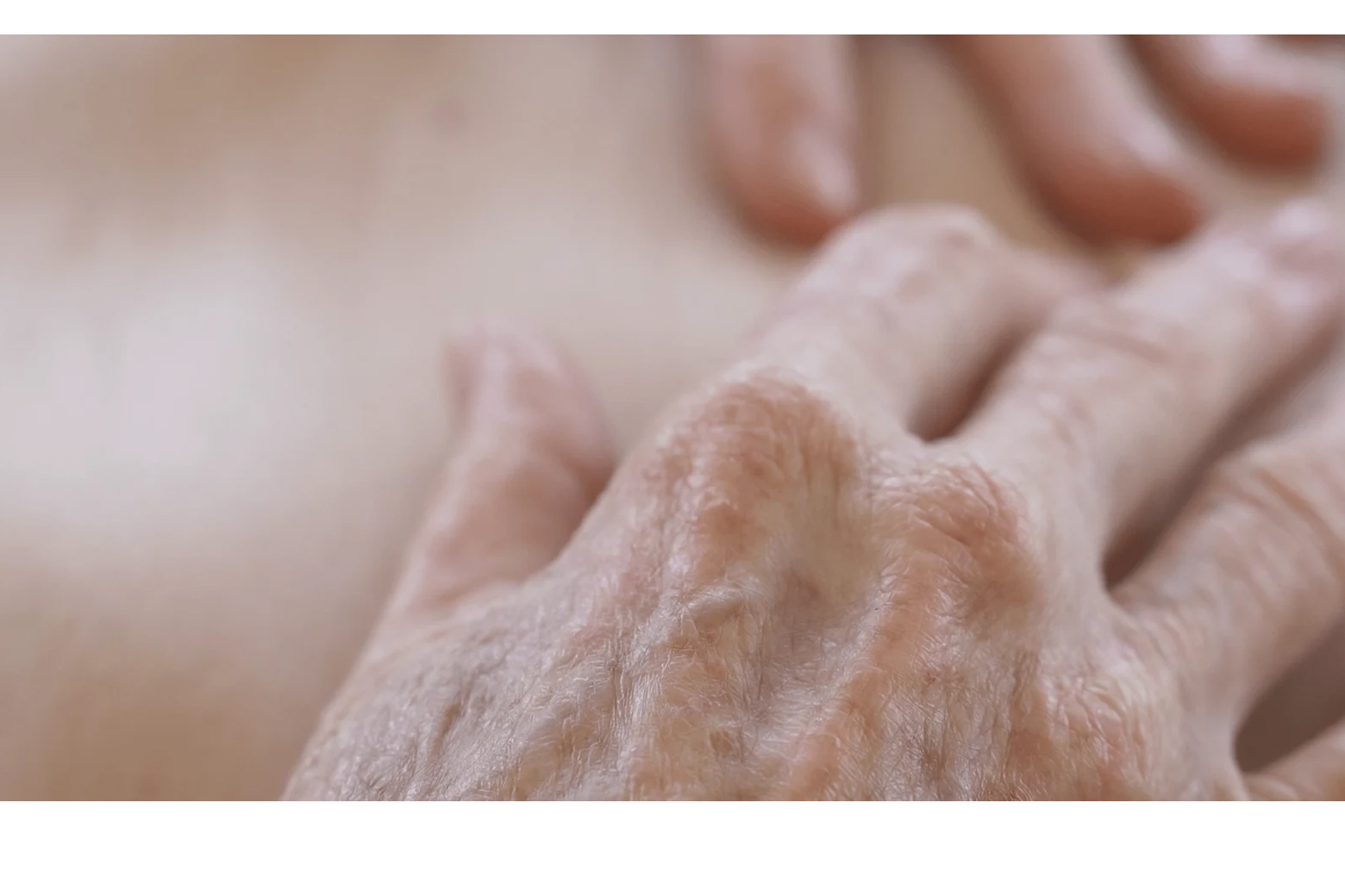 Close-up photograph of two hands