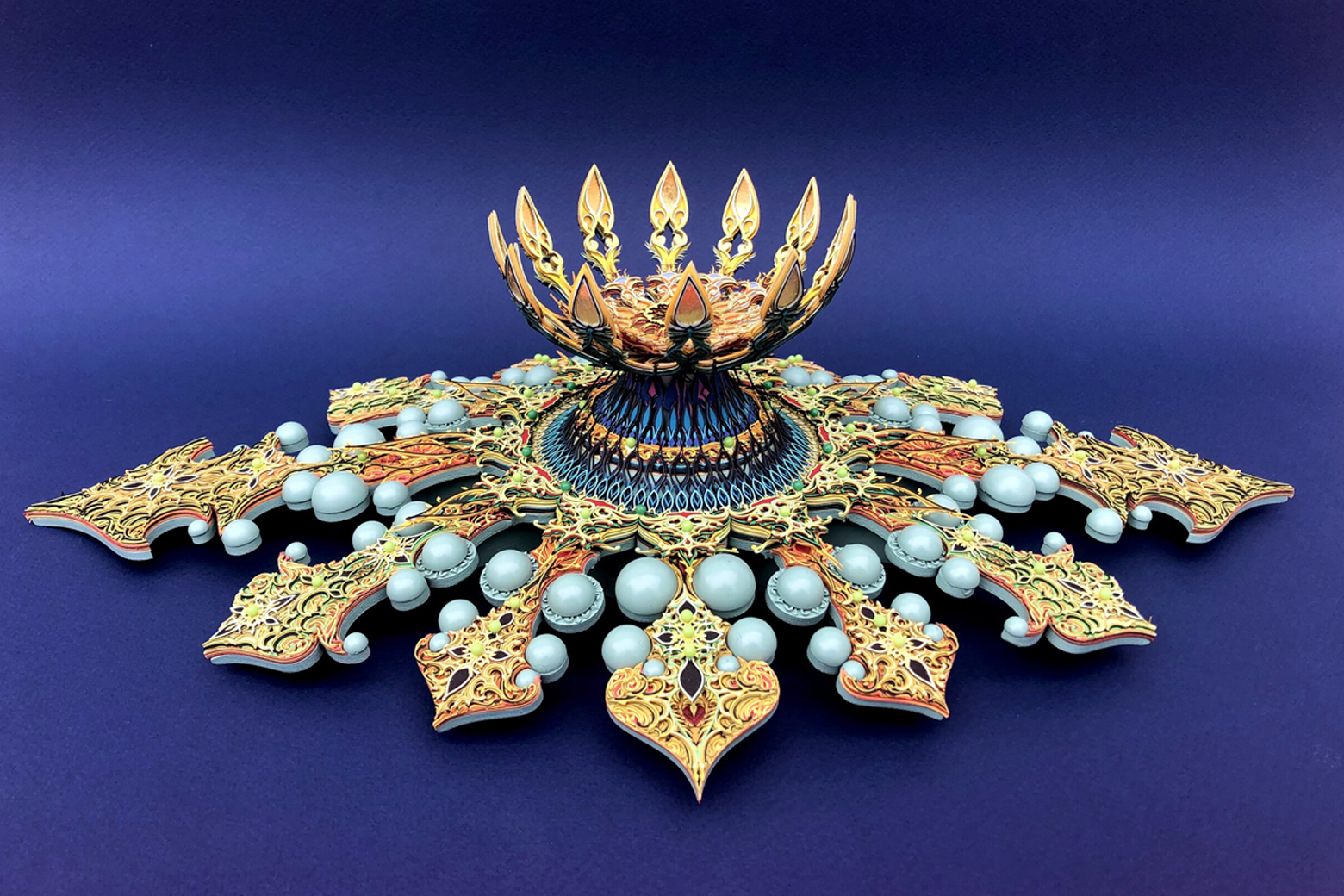 Paper folded to look like a fancy piece of jewelry