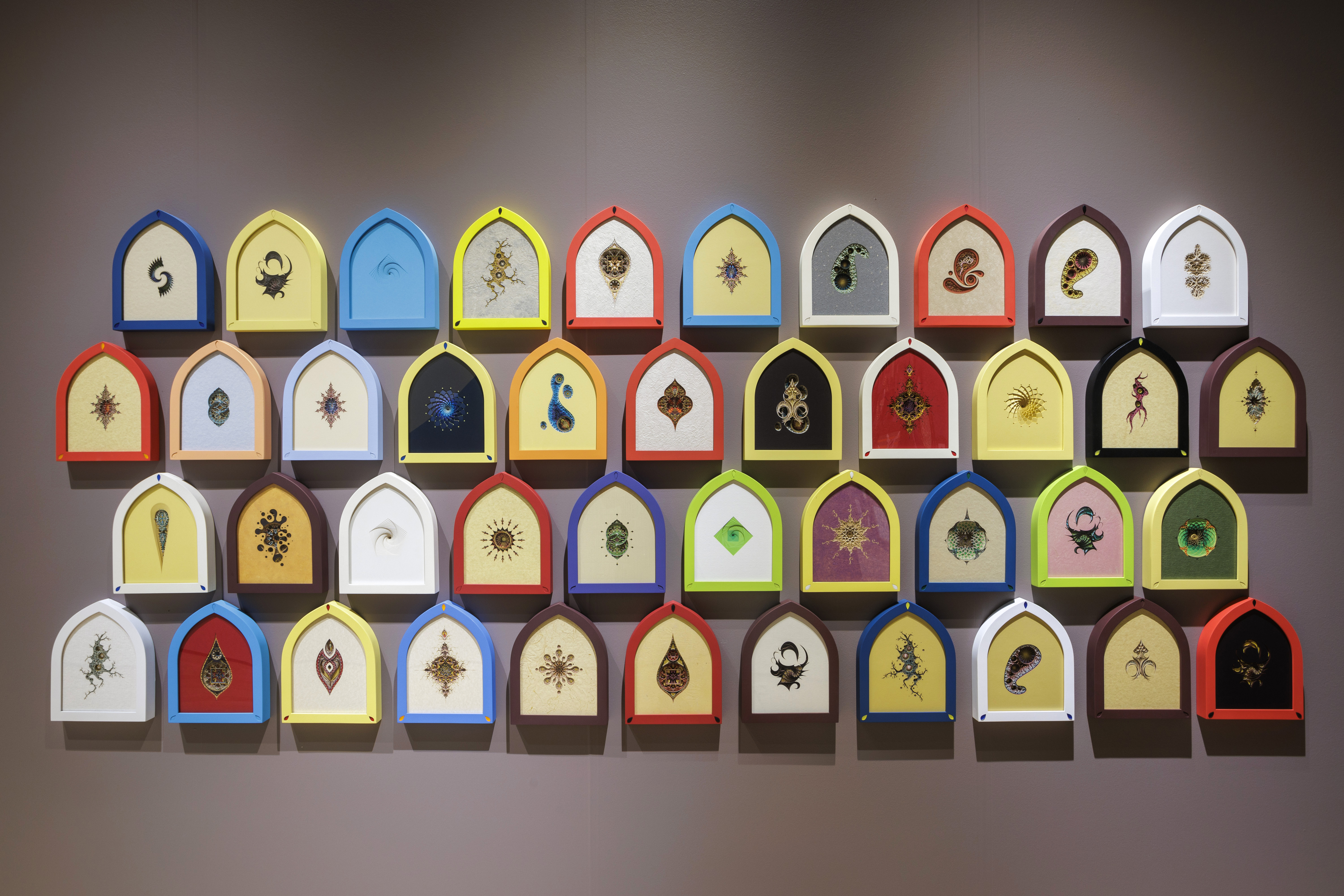 Arched mailbox shaped paper with different designs in the centers