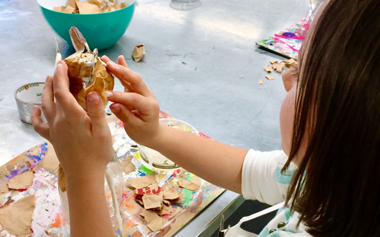 students create paper mache sculptures
