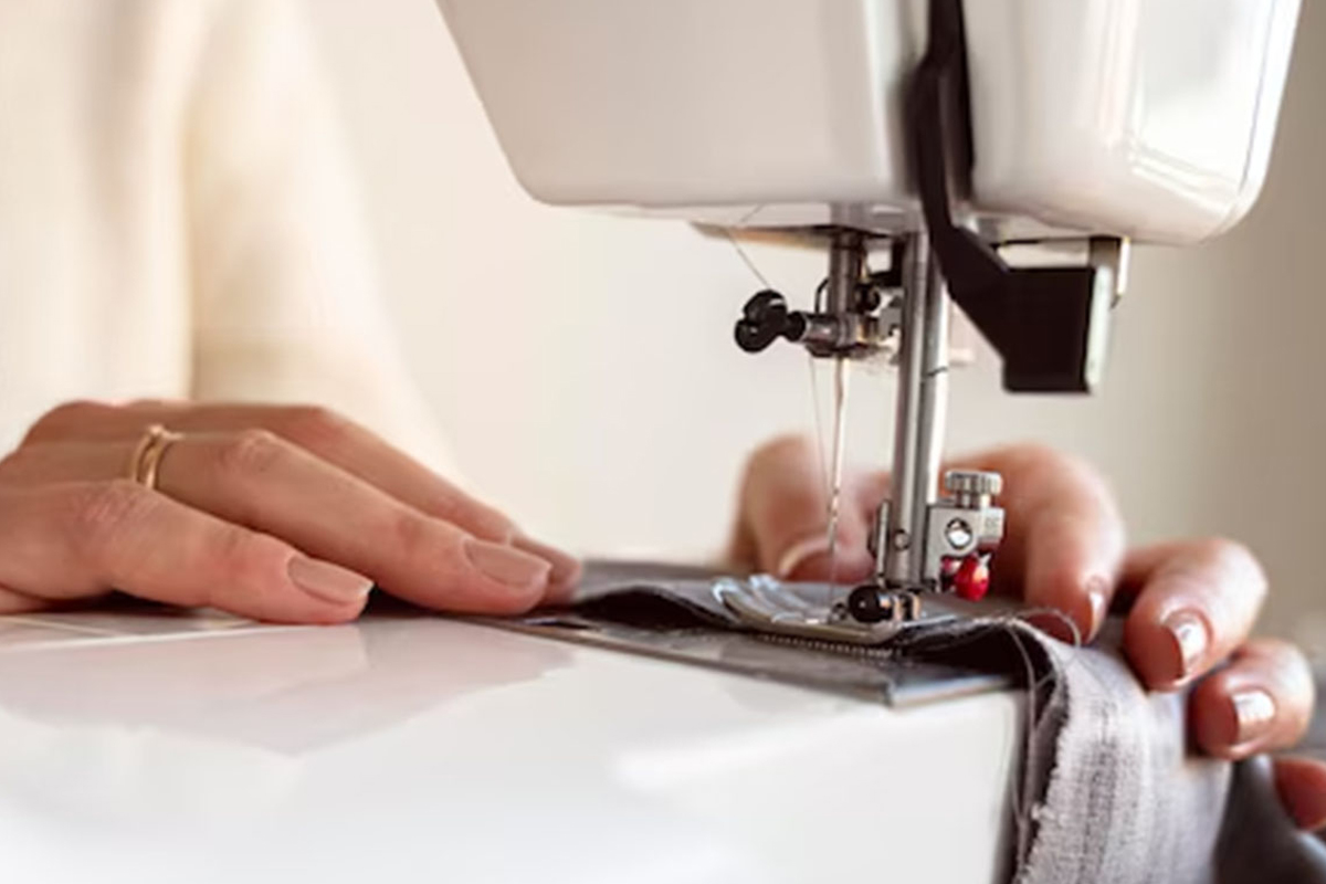 Fabric going through a sewing machine